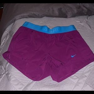 Purple Nike shorts